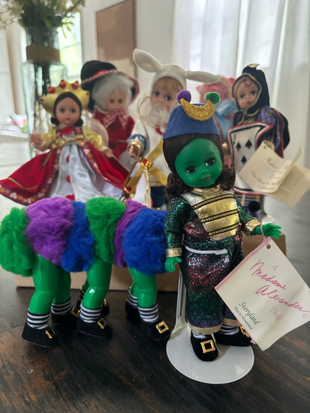 Madame Alexander Alice in wonderland dolls.